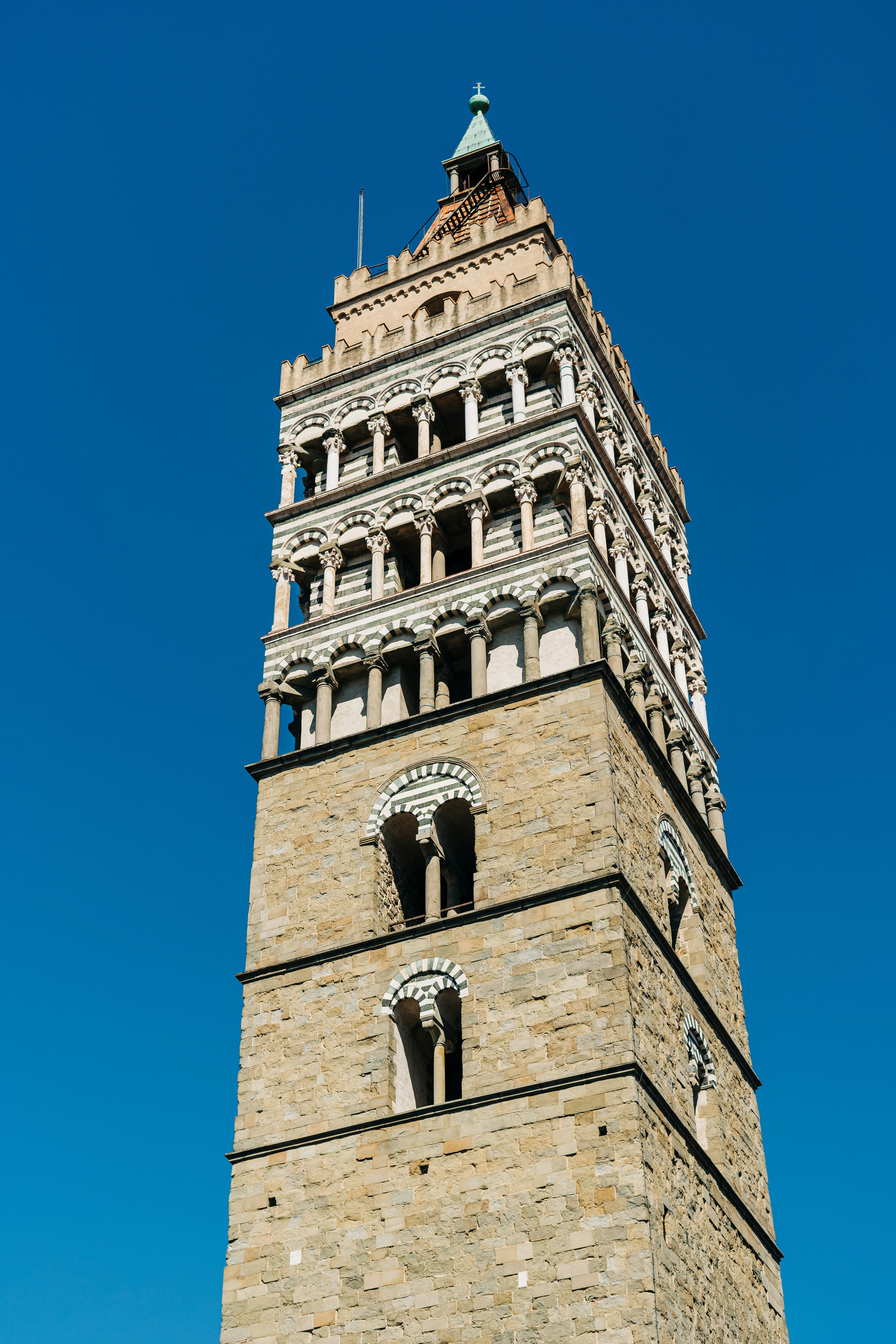 brown concrete building under blue sky during daytime